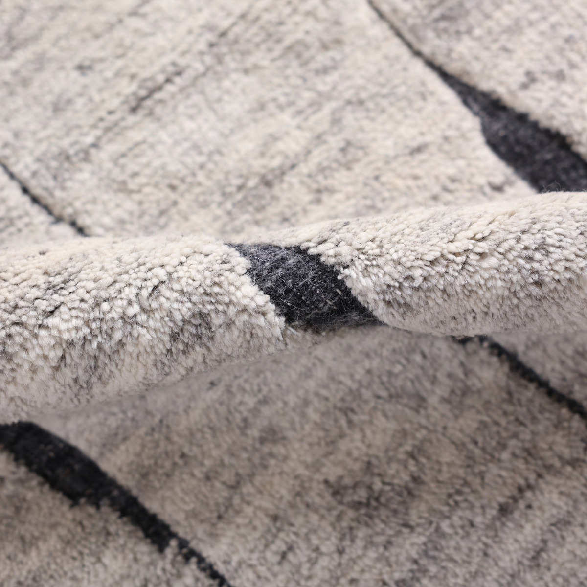 Monk Rug in Oyster/Nickel — styled angle