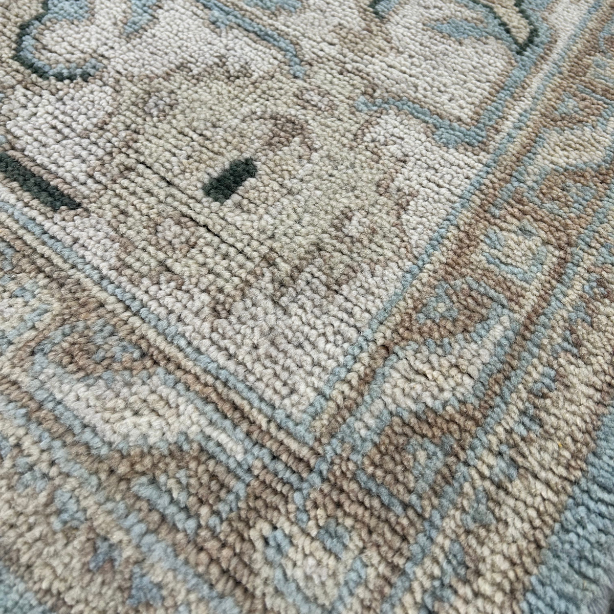 Safira Rug in Baby Blue/Cloud Dancer — styled angle
